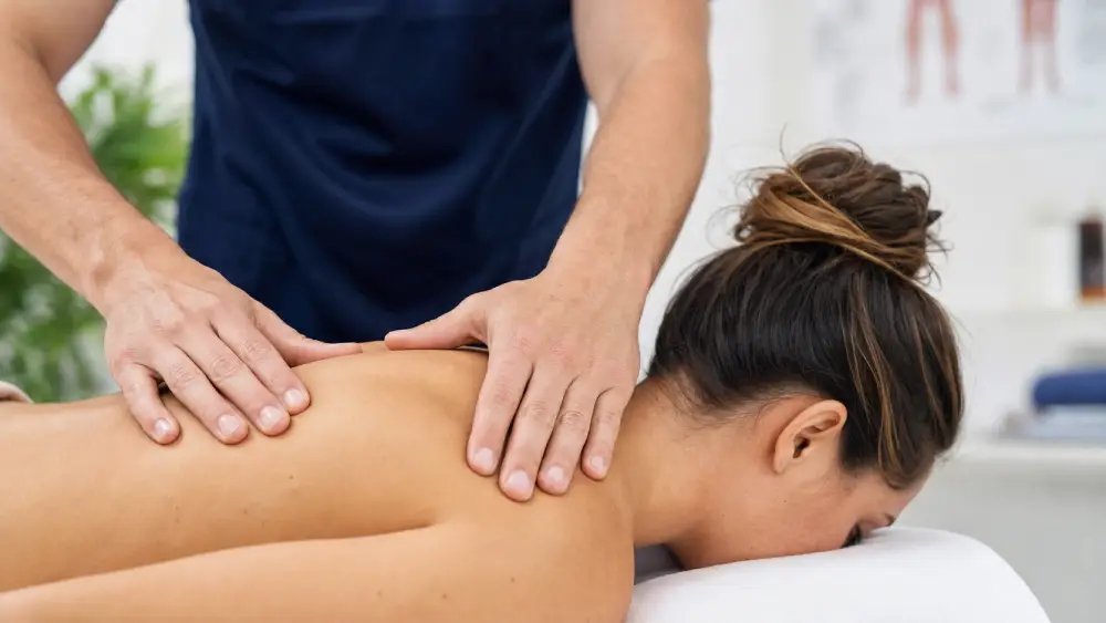 forward head posture Physiotherapist providing manual therapy to relieve tech neck stiffness and pain.